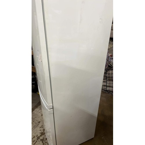 444 - ZANUSSI FRIDGE FREEZER HAS BEEN USED IN A GARAGE HAS MARKS