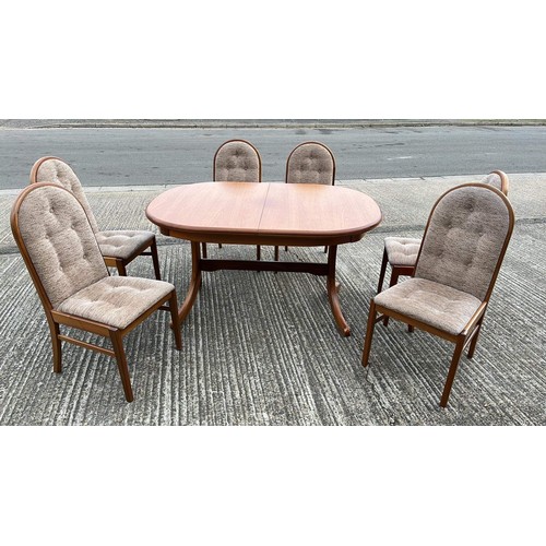 538 - TEAK OVAL EXTENDING DINNING TABLE WITH SIX CHAIRS