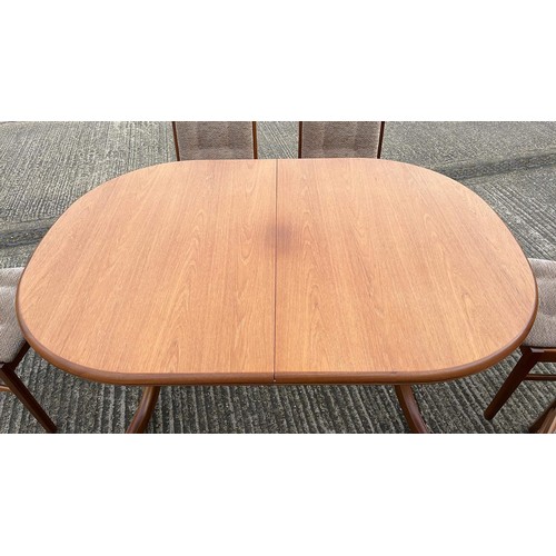 538 - TEAK OVAL EXTENDING DINNING TABLE WITH SIX CHAIRS