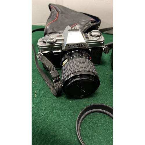 615 - MINOLTA X300 CAMERA AND LENSES AND MORE