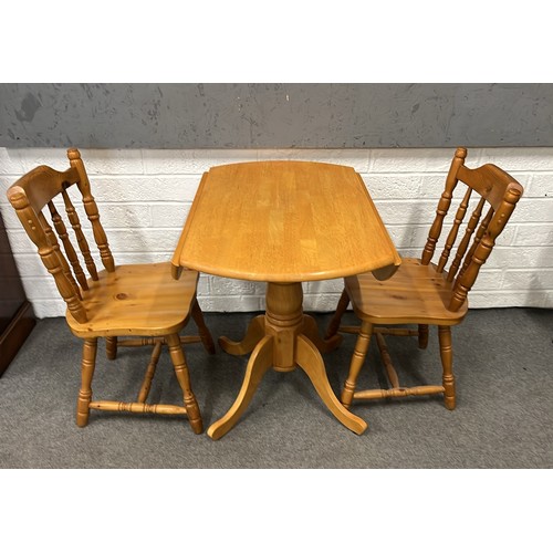 330 - ROUND DROP LEAF TABLE AND TWO CHAIRS