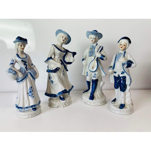 1 - FOUR LARGE BLUE AND WHITE FIGURES