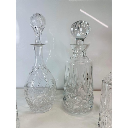 8 - FOUR MIXED CLEAR GLASS DECANTERS