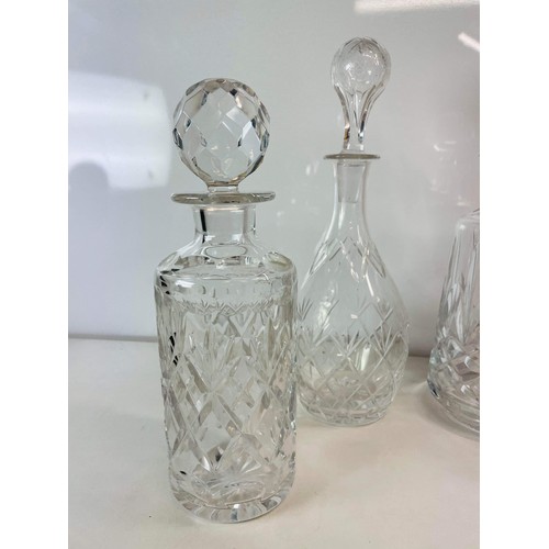 8 - FOUR MIXED CLEAR GLASS DECANTERS