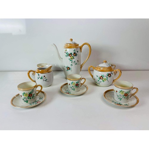 28 - ORIENTAL PART COFFEE SET SEE PICTURES FOR CONDITION ONE CUP CHIPPED