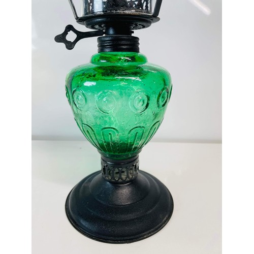 130 - GREEN AND BLACK SINGLE BURNER OIL LAMP