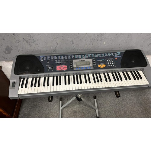 703 - CASIO  WK - 1200 key board no lead