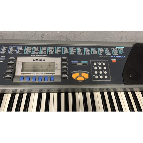 703 - CASIO  WK - 1200 key board no lead