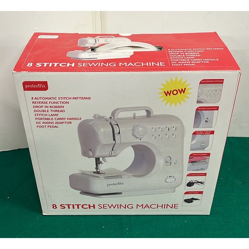 480 - BOXED 8 STITCH SEWING MACHINE