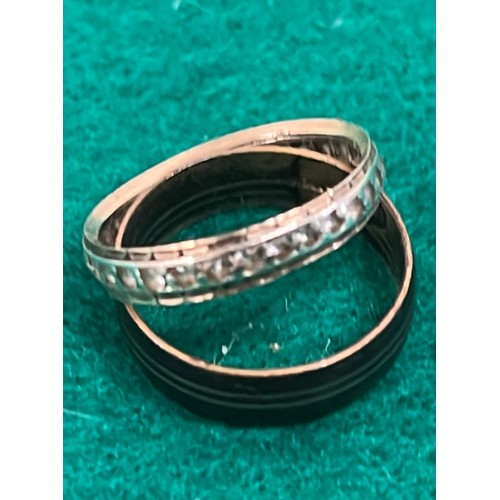 180 - ETERNITY RING IN SILVER AND GOLD PLUS A ROLLED GOLD RING