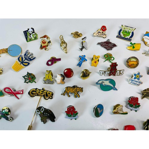 248 - LARGE QTY OF BADGES