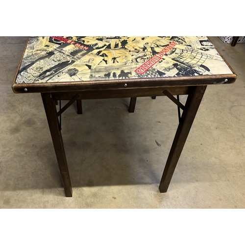 652 - TWO FOLDING CARD TABLES WITH COLLAGE TOPS