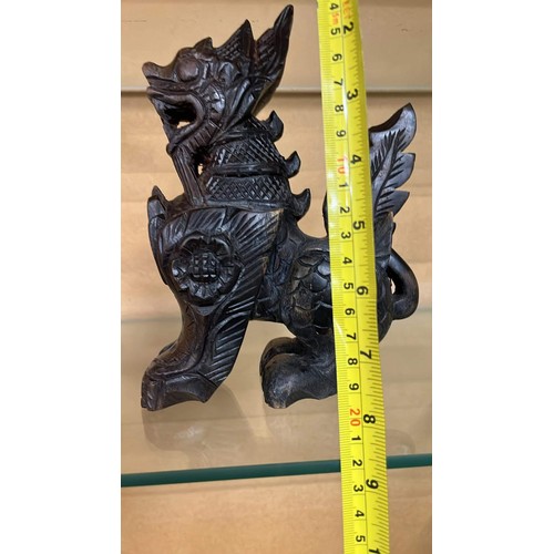 257 - CARVED ORIENTAL FOO DOG