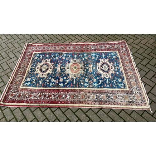 46 - RED AND BLUE PATTERN OVER RUG 211cm x 140cm