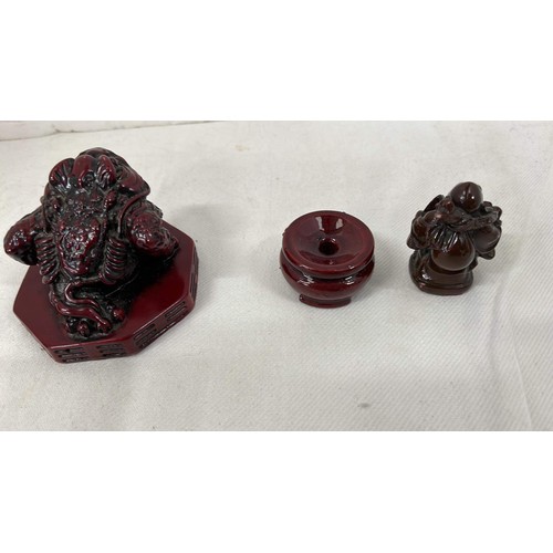 27 - RED ORIENTAL BUDDAS