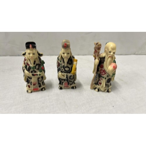 17 - THREE MINIATURE ORIENTAL GODS