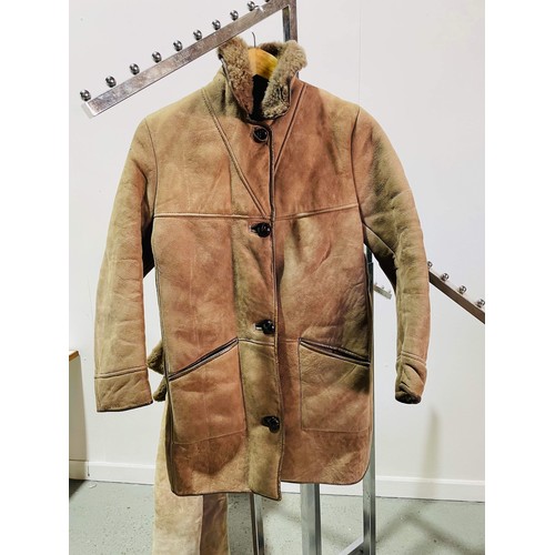 67 - TWO ROYAL PELTS COATS