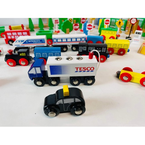 165 - COLOURED WOODEN TOYS