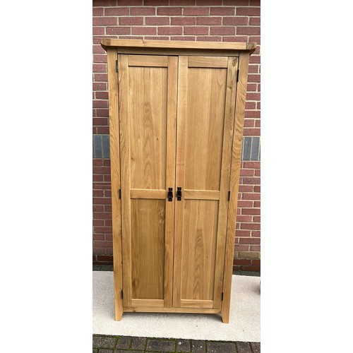 757 - LIGHT OAK TWO DOOOR WARDROBE