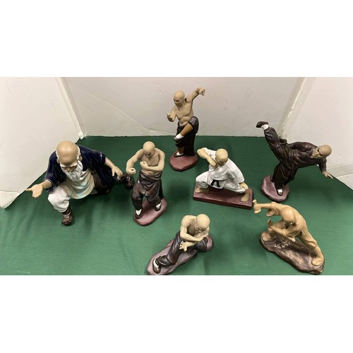 168 - ORIENTAL MARTIAL ART FIGURES