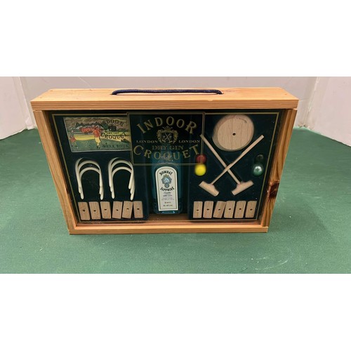 165 - WOODEN BOXED INDOOR CROQUET SET WITH GIN SEALED