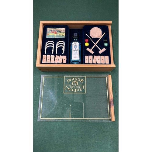 165 - WOODEN BOXED INDOOR CROQUET SET WITH GIN SEALED