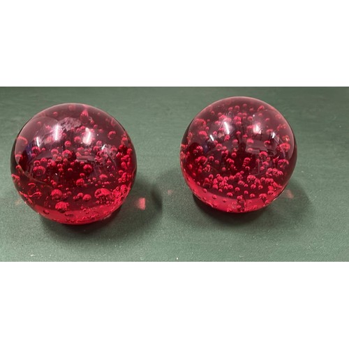 161 - TWO RED GLASS PAPER WEIGHTS