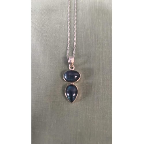 106 - BLUE STONE PENDENT AND CHAIN SILVER