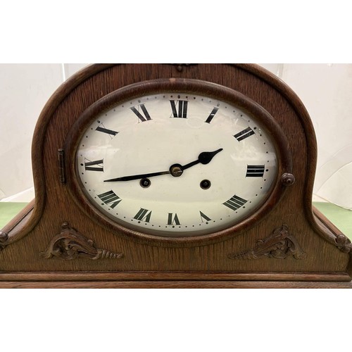 297 - LARGE OAK MANTLE CLOCK WORKING