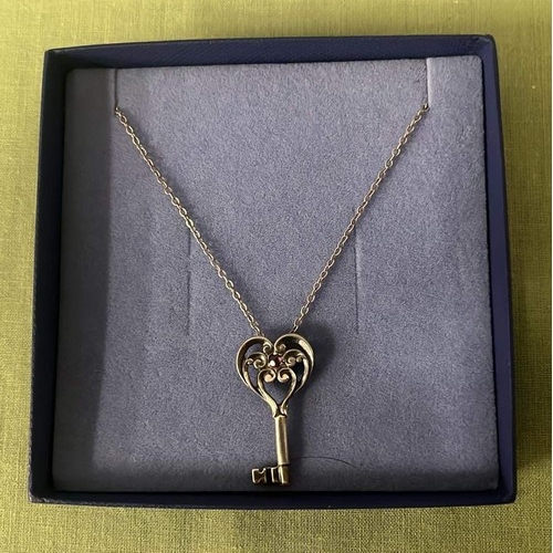 102 - SILVER KEY PENDENT AND CHAIN