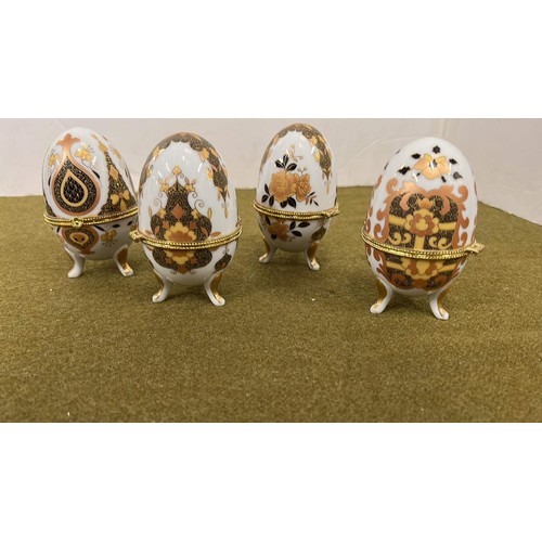 340 - FOUR FABERGE STYLE EGGS