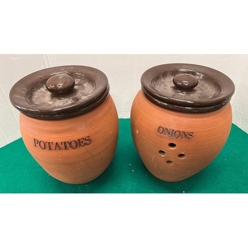 687 - TWO TERRACOTTA STORAGE JARS