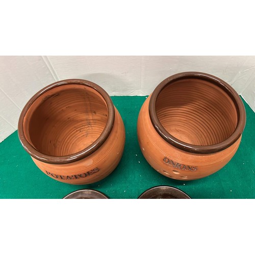 687 - TWO TERRACOTTA STORAGE JARS