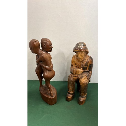 79 - TWO WOODEN CARVED FIGURES