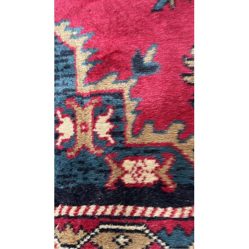 372 - OVER RUG