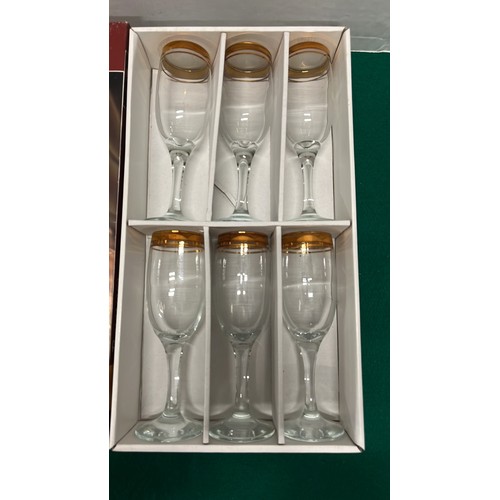 124 - BOXED GLASS SET