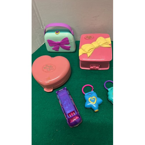 141 - SELECTION OF POLLY POCKETS