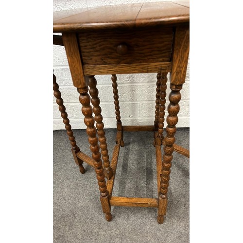 107 - SMALL OAK GATE LEG TABLE WITH DRAWER