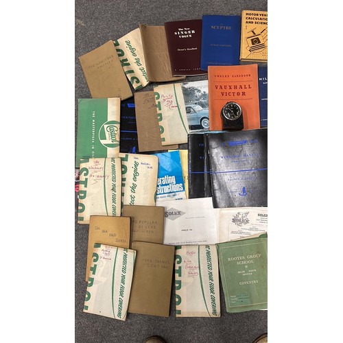 484 - QTY OF MIXED VINTAGE CAR MANUALS AND CLOCK