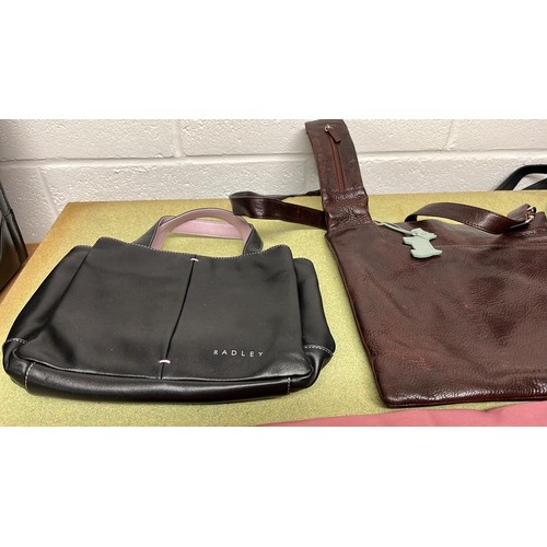 596 - THREE RADLEY HAND BAGS