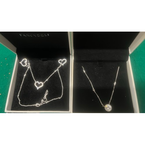 711 - TWO NECKLACE SETS