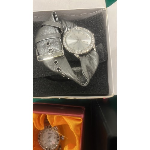 704 - SELECTION OF BOXED WATCHES