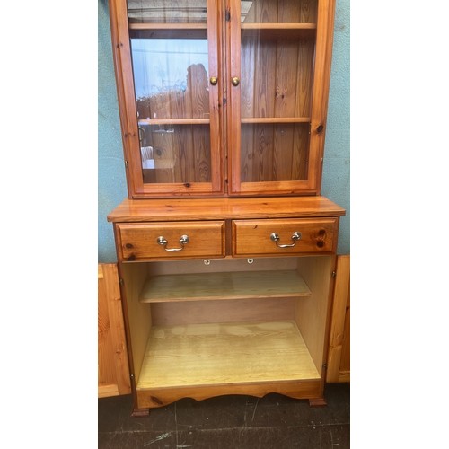 817 - DUCAL SOLID PINE GLASSTOP CUPBOARD