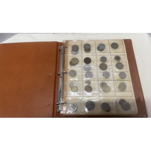 98 - BROWN FOLDER WITH 100 WORLD WIDE COINS