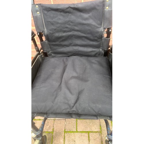 784 - FOLDING WHEEL CHAIR / USED