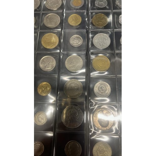 53 - FOLDER OF 400 WORLD COINS