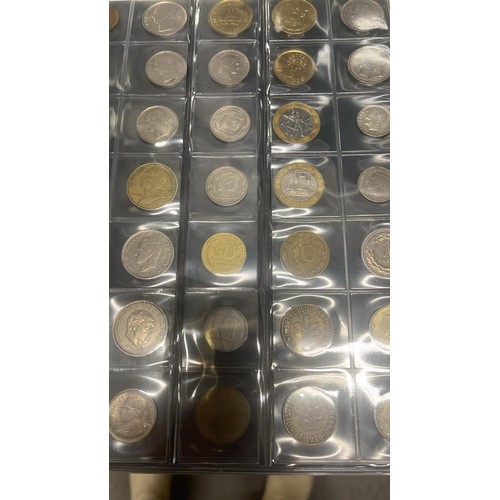 53 - FOLDER OF 400 WORLD COINS