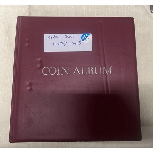 51 - FOLDER OF 300 WORLD COINS