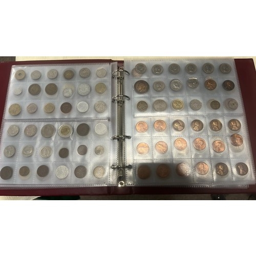 51 - FOLDER OF 300 WORLD COINS