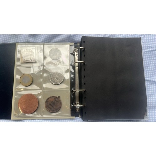 808 - FOLDER OF 400 WORLD COINS